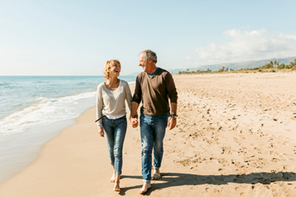 A couple walking on a beach